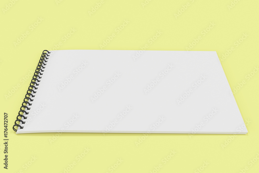 Blank white notebook with black spiral bound on yellow background Blank white notebook with black spiral bound on yellow background