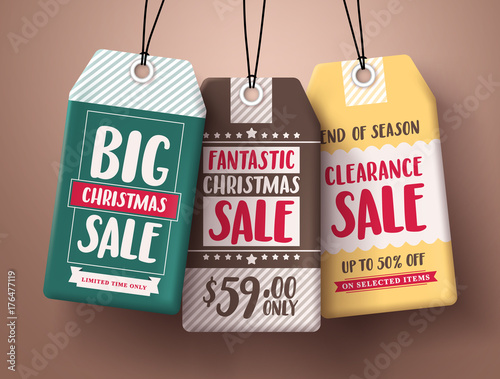 Big Christmas sale vector paper price tags hanging with different colors and discount text for christmas holiday promotion. Vector illustration.
