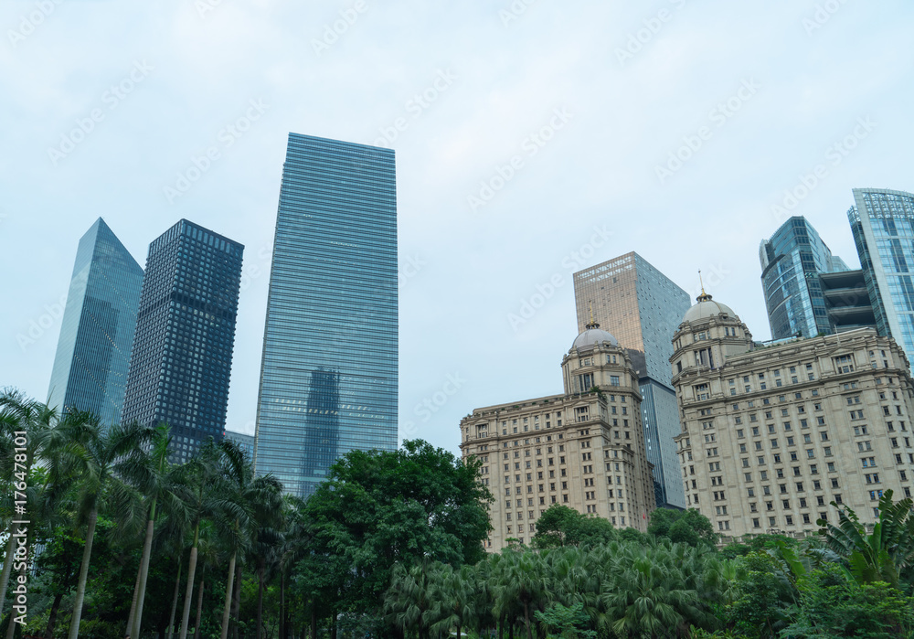 directly below of modern financial skyscrapers in central Hong Kong,blue toned,china.