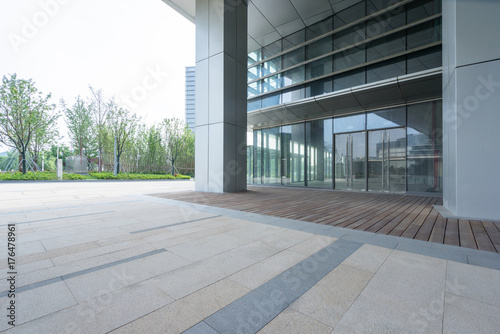 Photography modern glass building exterior with empty pavement,copy space,shanghai,china