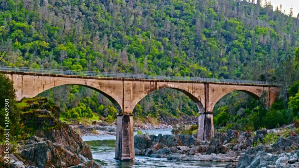 Aerial of American river near Foresthill, Auburn-Foresthill or Auburn road bridge crossing over the North Fork American River in Placer County and the Sierra Nevada foothills, in eastern California. 