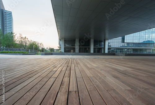 modern glass building exterior with empty pavement,copy space,shanghai,china.