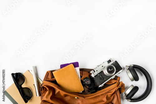 Top view of travel accessories on white table, Modern Vintage items concept with Copy space