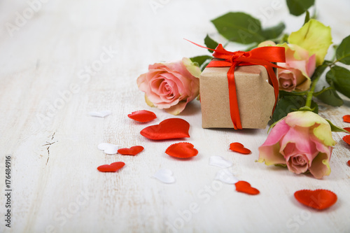 Pink roses, gift and hearts