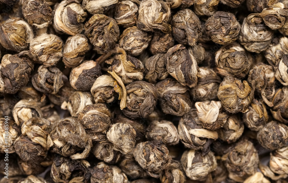 Dry green tea balls macro shot, abstract texture Dry green tea balls macro shot, abstract texture