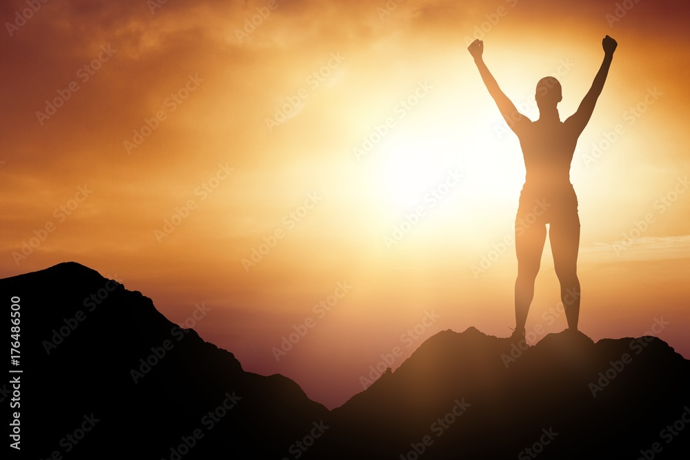 Composite image of cheerful woman with arms raised while