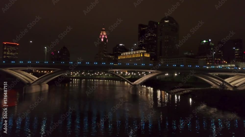 night view of downtown Columbus Ohio skyline flying left along Rich St. Bridge night view of downtown Columbus Ohio skyline flying left along Rich St. Bridge
