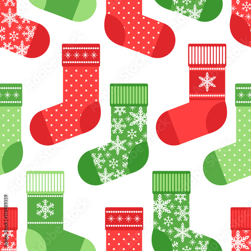 Cute winter seamless pattern with socks in traditional colors