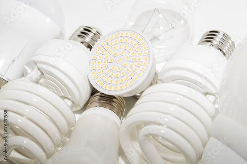 Several different led bulbs and compact fluorescent lamps photo