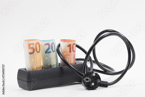 Euro bill, power strip and electricity cost photo