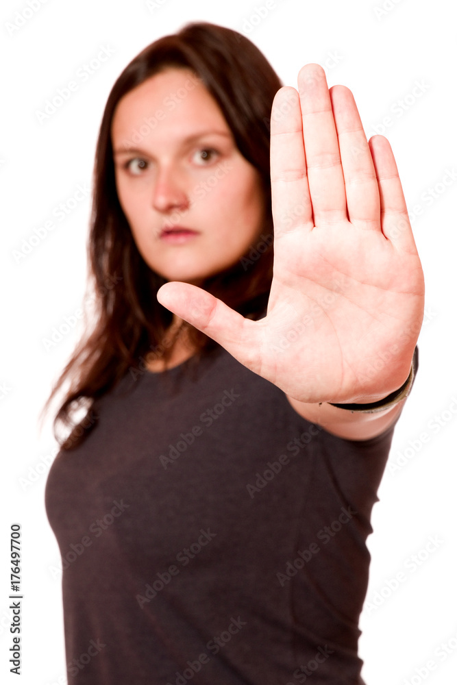 Attraktive junge Frau zeigt Stop Attraktive junge Frau zeigt Stop