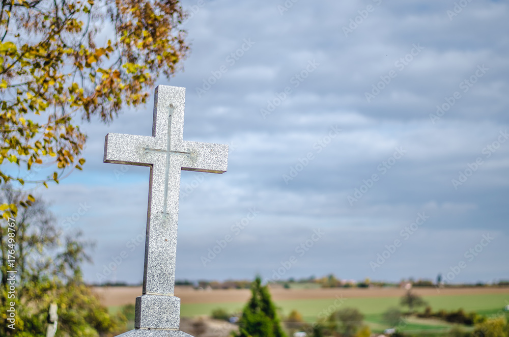 stone cross at cemetery