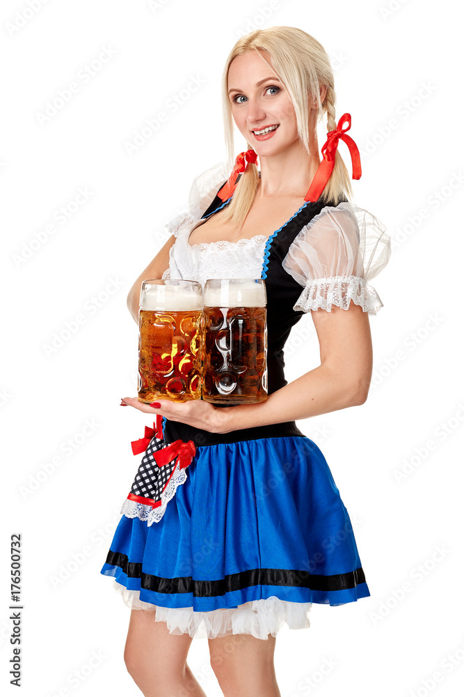 Full length portrait of a blond woman with traditional costume holding beer glasses isolated on white background. Full length portrait of a blond woman with traditional costume holding beer glasses isolated on white background.