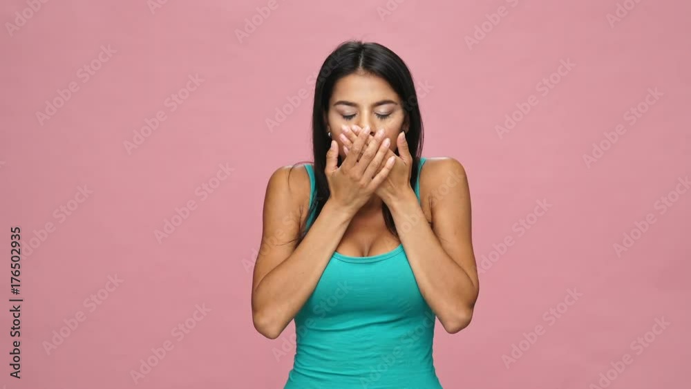 Shocked brunette woman surprising and looking camera isolated over pink Shocked brunette woman surprising and looking camera isolated over pink