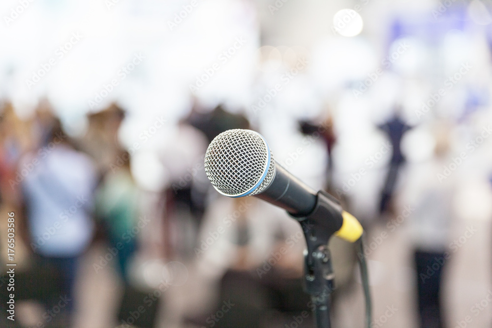 Press conference. Microphone in focus against blurred audience. Press conference. Microphone in focus against blurred audience.