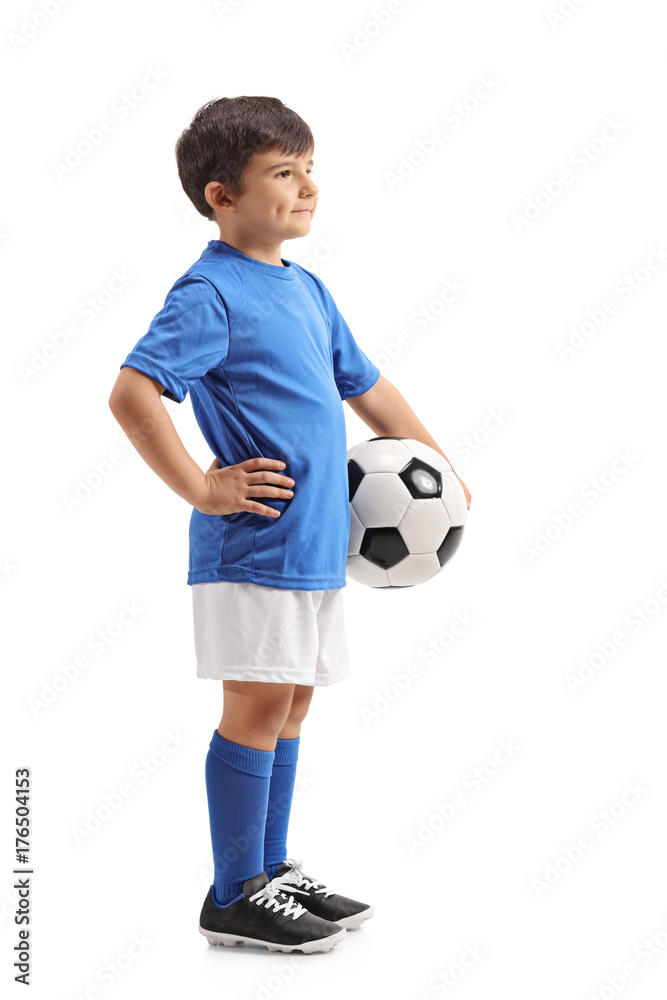 Fototapeta premium Little soccer player with a football waiting in line