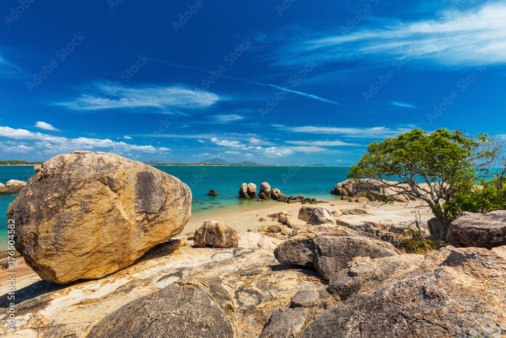 Horseshoe Bay at Bowen - iconic beach with granite rocks, north Queensland, Australia
