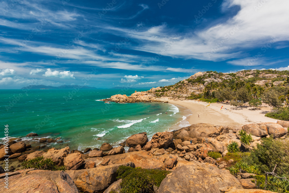Horseshoe Bay at Bowen - iconic beach with granite climbing rocks, Australia