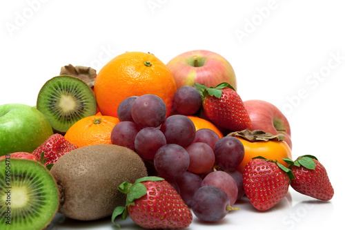 fresh fruits and berries on a white background