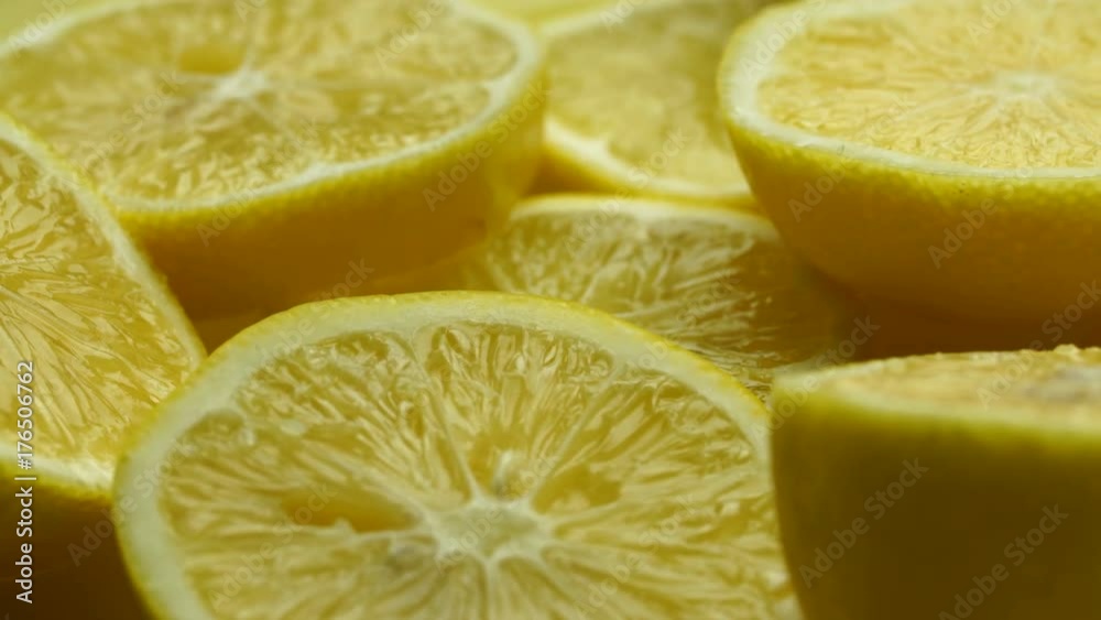 Lemon slices with mint leaf rotation background. Close-up of a delicious ripe lemon rotate and aromatic mint. Healthy food, cooking ingredient. UHD video footage. Ultra high definition 3840X2160 Lemon slices with mint leaf rotation background. Close-up of a delicious ripe lemon rotate and aromatic mint. Healthy food, cooking ingredient. UHD video footage. Ultra high definition 3840X2160