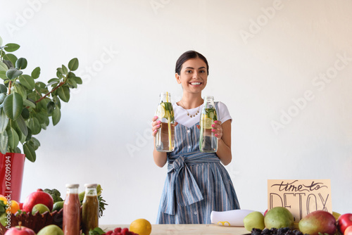 woman with detox drinks
