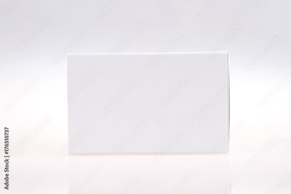 Pils or capsules carton package on gray background Pils or capsules carton package on gray background