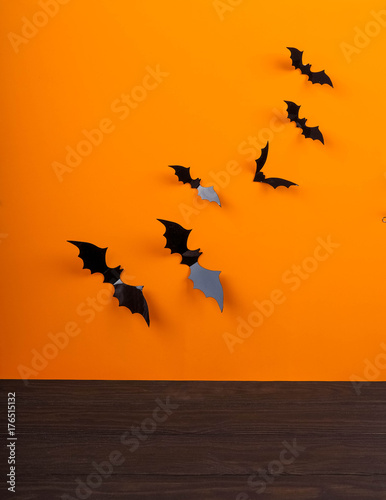 bat Halloween orange bright Vaughn, copy space, cute, humorous backdrop for a fun filled holiday, flat lay, black spiders and pumpkin.