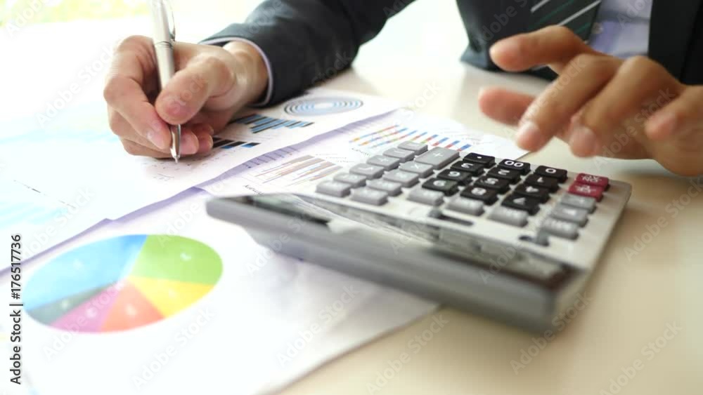 Business people doing analysis planning business project in office. Business people doing analysis planning business project in office.