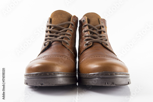 Male brown leather boot on white background, isolated product.