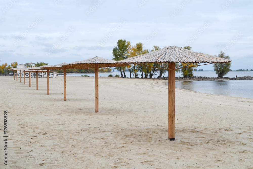straw umbrellas on the beach