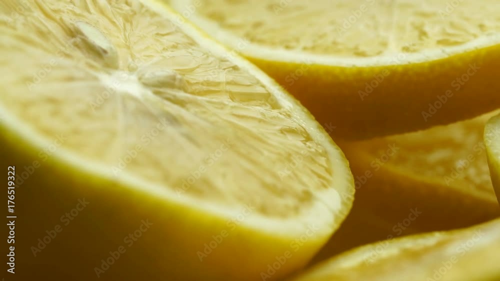 Lemon slices with mint leaf rotation background. Close-up of a delicious ripe lemon rotate and aromatic mint. Healthy food, cooking ingredient. UHD video footage. Ultra high definition 3840X2160 Lemon slices with mint leaf rotation background. Close-up of a delicious ripe lemon rotate and aromatic mint. Healthy food, cooking ingredient. UHD video footage. Ultra high definition 3840X2160