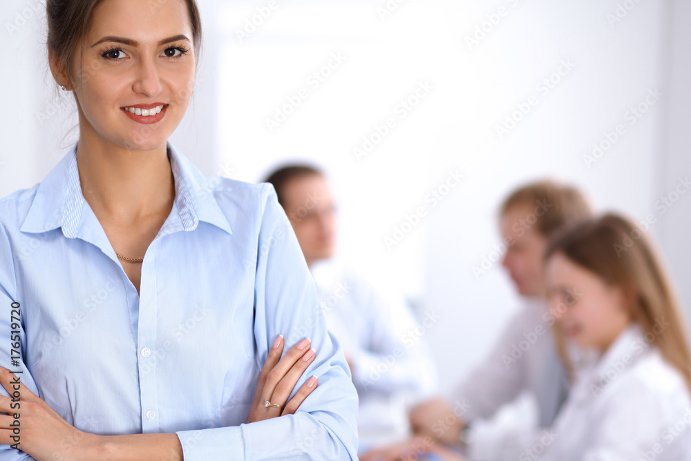 Beautiful business woman at meeting 