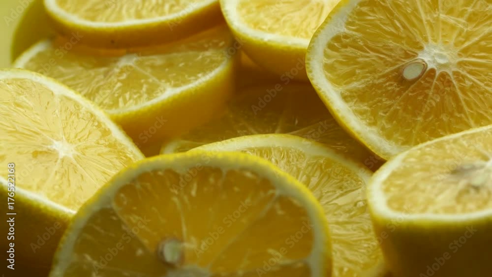 Lemon slices with mint leaf rotation background. Close-up of a delicious ripe lemon rotate and aromatic mint. Healthy food, cooking ingredient. UHD video footage. Ultra high definition 3840X2160 Lemon slices with mint leaf rotation background. Close-up of a delicious ripe lemon rotate and aromatic mint. Healthy food, cooking ingredient. UHD video footage. Ultra high definition 3840X2160