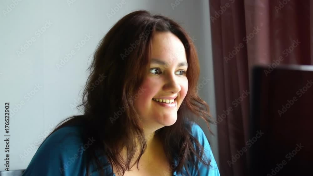 beautiful young emotional woman in front of computer working and getting good new, happy positive reaction expression beautiful young emotional woman in front of computer working and getting good new, happy positive reaction expression