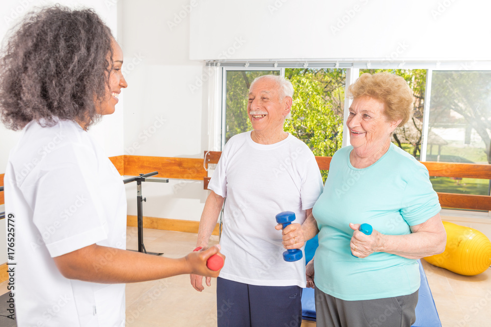 Fototapeta premium African nurse reassuring patient in hospital