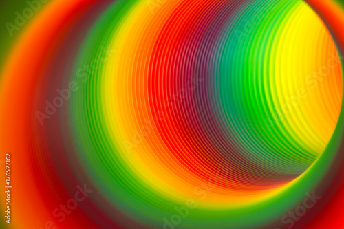 view through a vibrant rainbow colored spring with selective focus