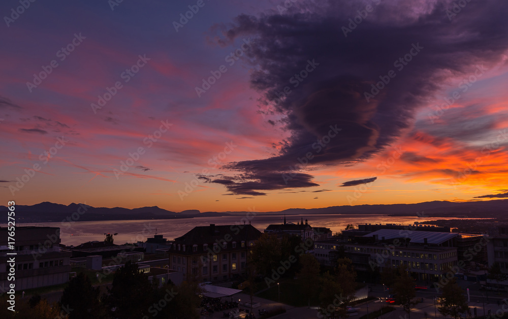 Sunset and dramatic sky. Lausanne city