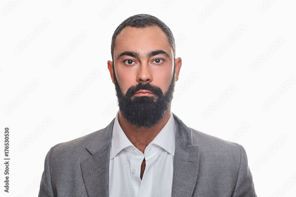 Serious, bearded male dressed in a suit. Serious, bearded male dressed in a suit.