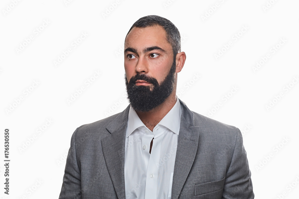 Serious, bearded male dressed in a suit. Serious, bearded male dressed in a suit.