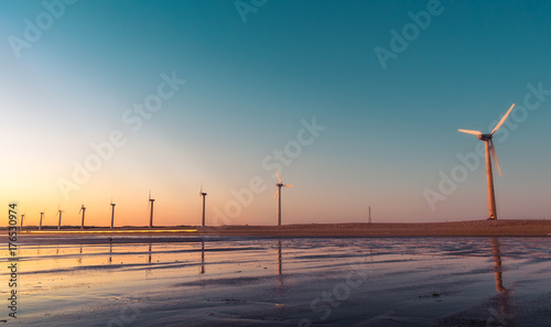 Colorful beach; Hues in the sky; Sunset scene on the beach; Indian beaches. windmills in the queue. one missing photo