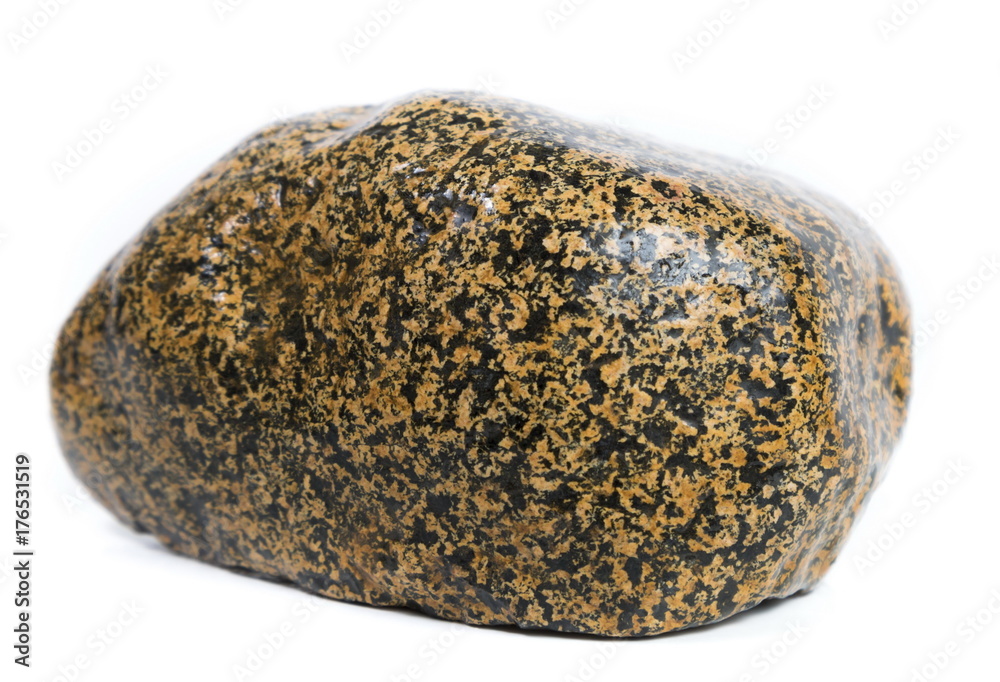 Single natural stone on white background, close-up Single natural stone on white background, close-up