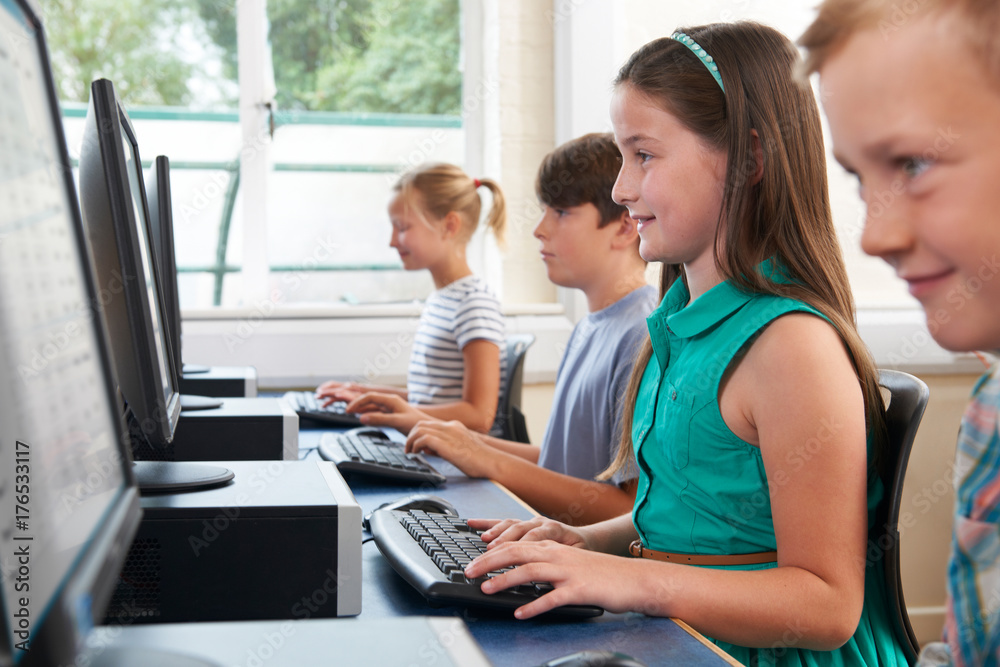 Group Of Elementary School Children In Computer Class Group Of Elementary School Children In Computer Class