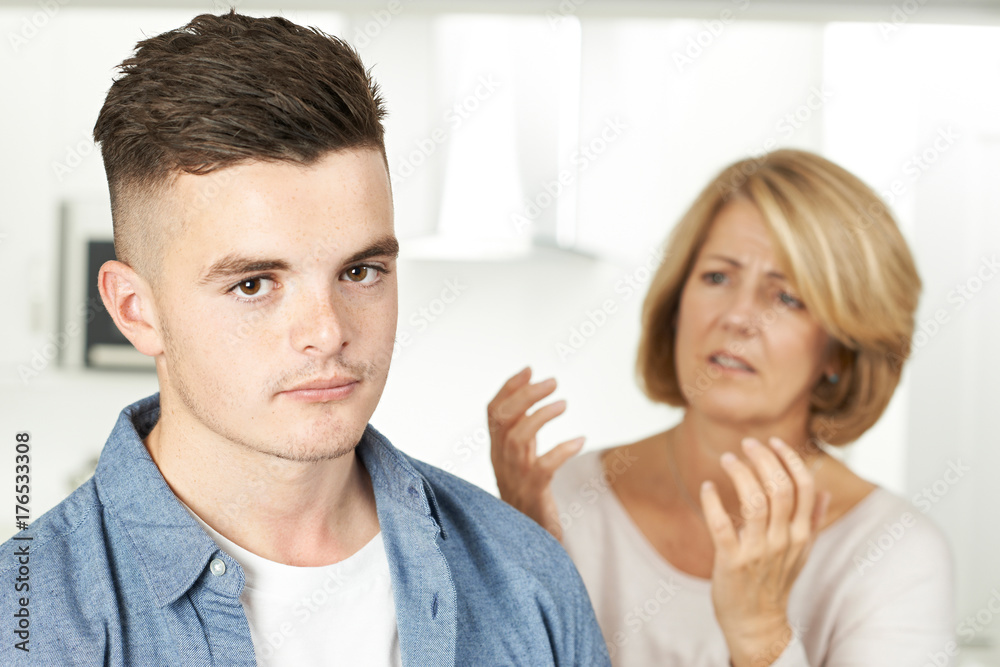 Mother Arguing With Teenage Son At Home Mother Arguing With Teenage Son At Home