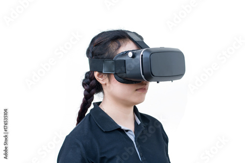 young casual woman using Virtual reality headset isolated on white © Achira22