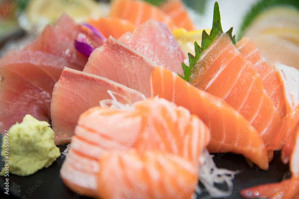 sashimi set with different fresh fish sliced on plate sashimi set with different fresh fish sliced on plate