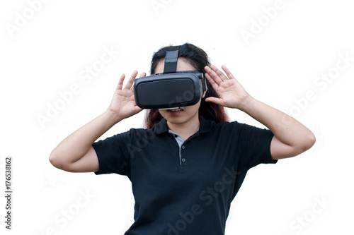 young casual woman using Virtual reality headset isolated on white