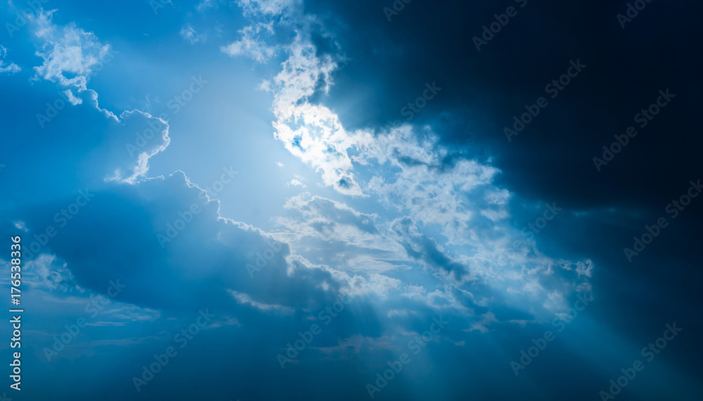 Sun rays through clouds like an dramatic explosion Sun rays through clouds like an dramatic explosion