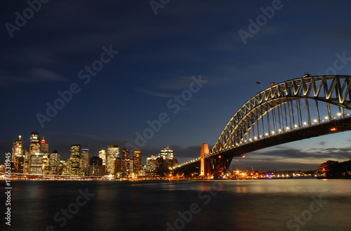 Harbour bridge and skyscraper of Sydney by night photographed from Kirribilli © Alexander