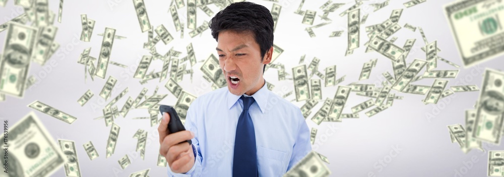 Composite image of portrait of an angry businessman hanging up Composite image of portrait of an angry businessman hanging up