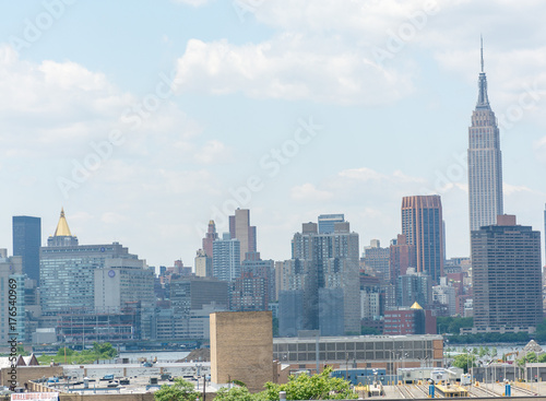 NEW YORK CITY - JUNE 9, 2013: Aerial view of Midtown skyscrapers. New York attracts 50 million tourists every year